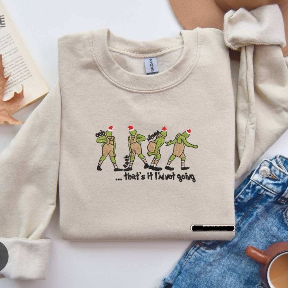 Cream printed grinch Christmas shirt